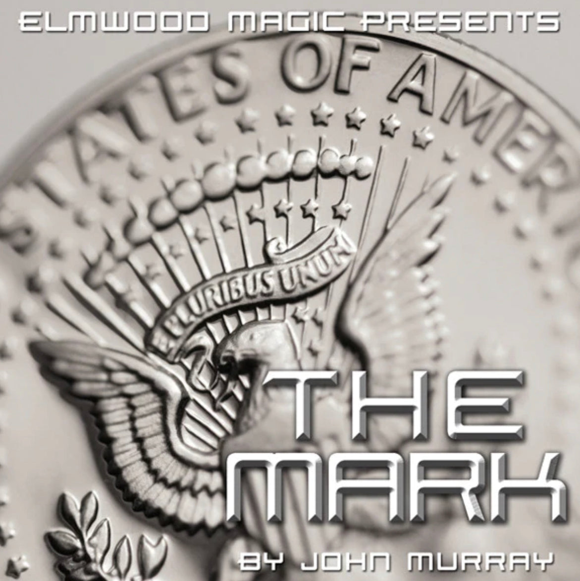 Hand holding a half dollar on a keychain, showcasing a magic trick, with a close-up of a US half dollar coin in the background.