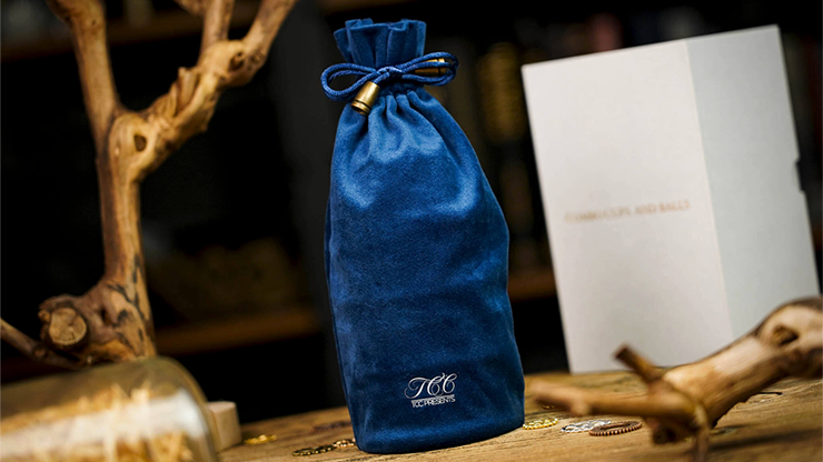Blue bag that holds cups and balls for the magic trick
