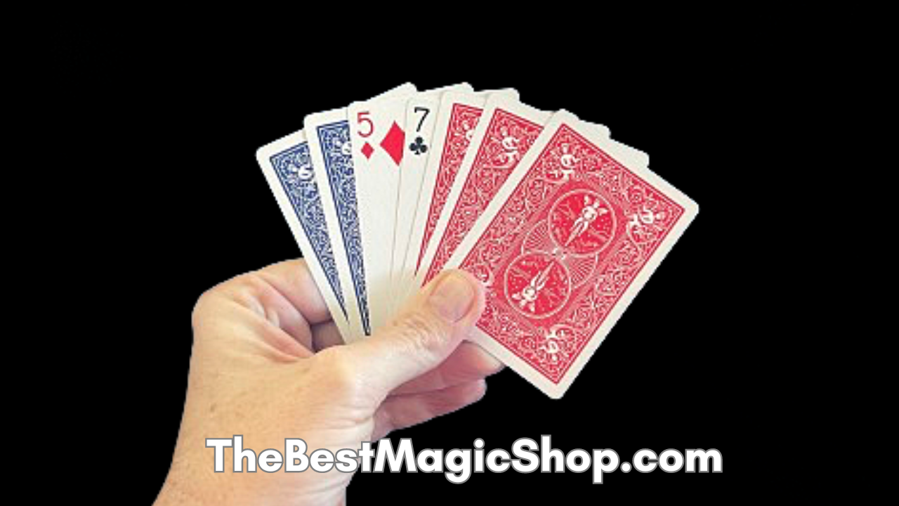 Hand holding several playing cards, showing numbers five and seven of diamonds and clubs, and red and blue suits.