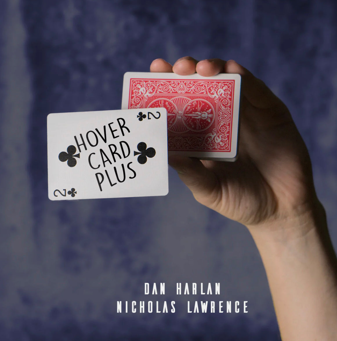 Hand holding two playing cards, one a promotional card with "HOVER CARD PLUS" text, the other a standard red playing card.