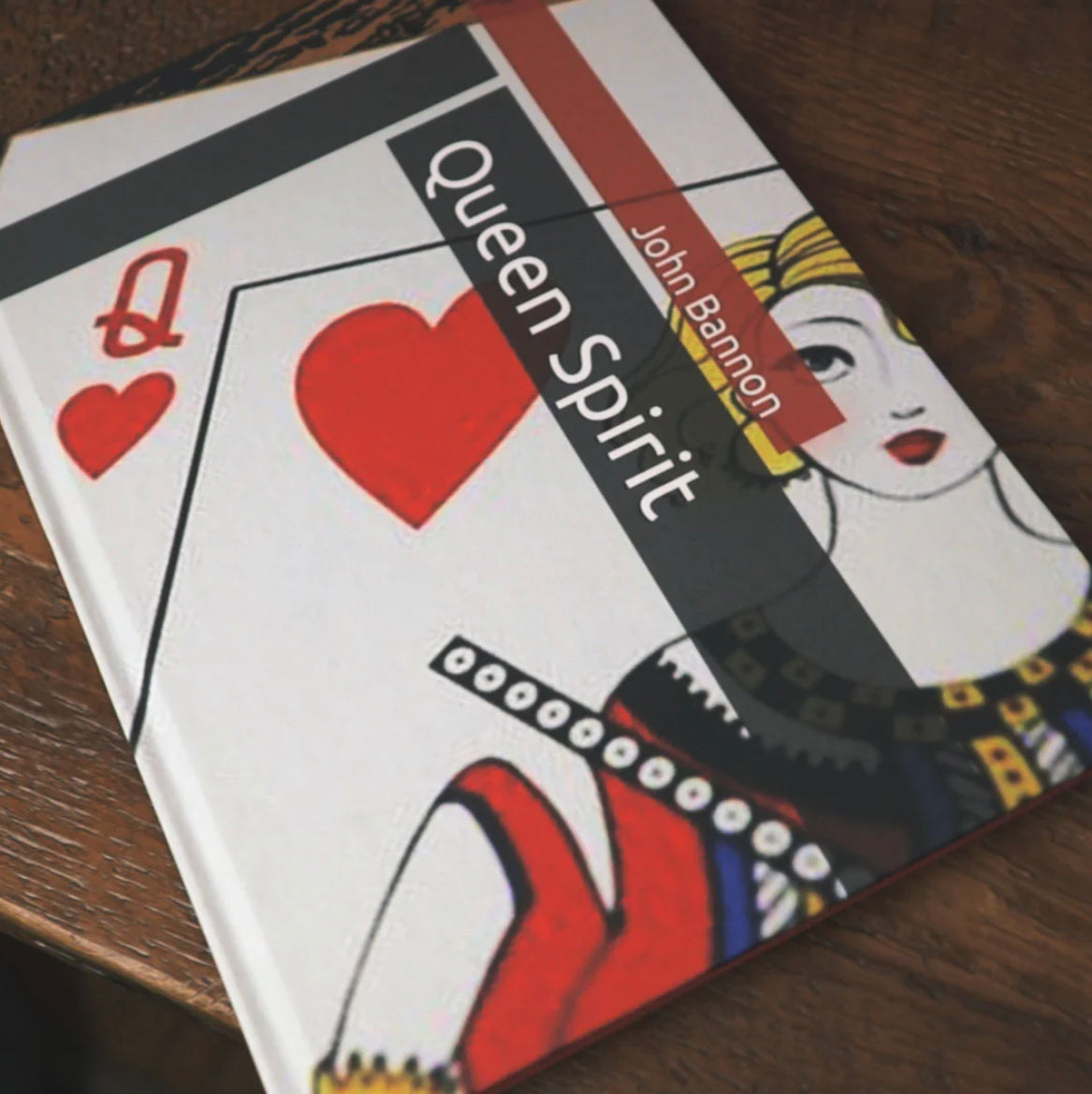 Front cover of magic book titled "Queen Spirit" by John Bannnon.