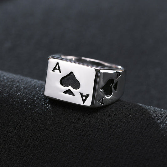 Silver ring featuring a square face with an ace of spades design.