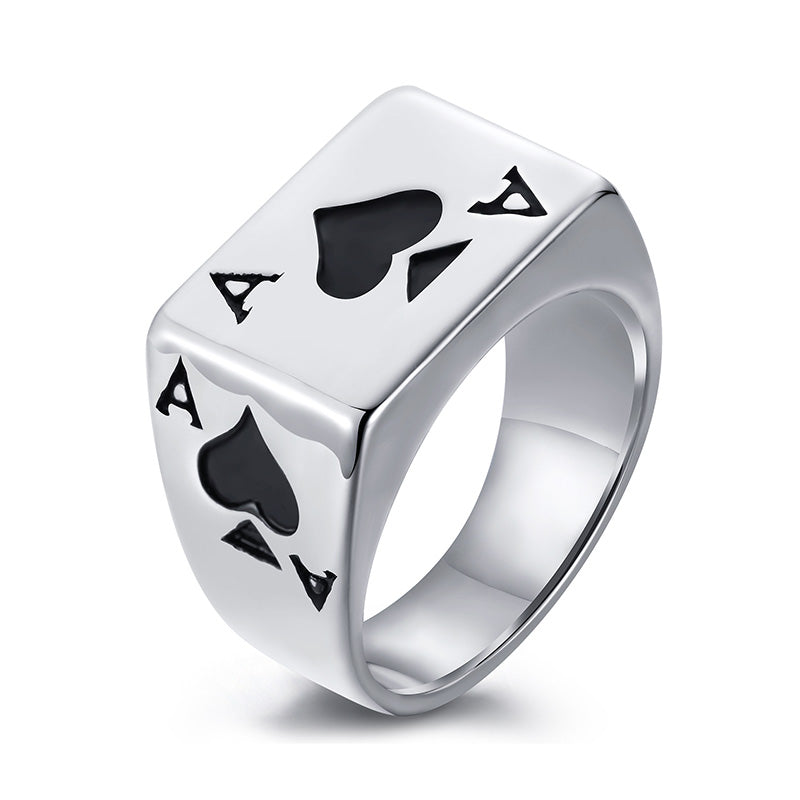 Silver ring featuring two black spade ace card symbols.