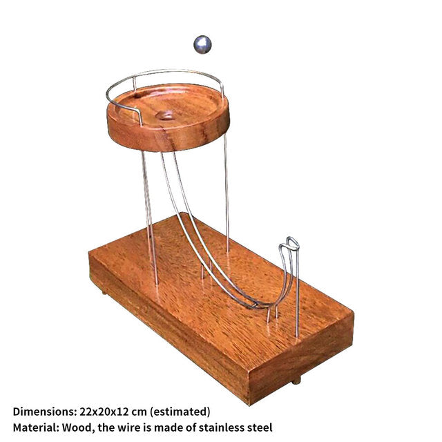 Wooden ball-launching toy with two metal ramps and a circular wooden platform with dimensions.