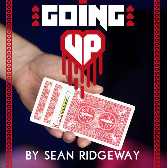 Hand performing a card magic trick, showcasing stacked playing cards with a graphic of "GOING UP" overlaid.