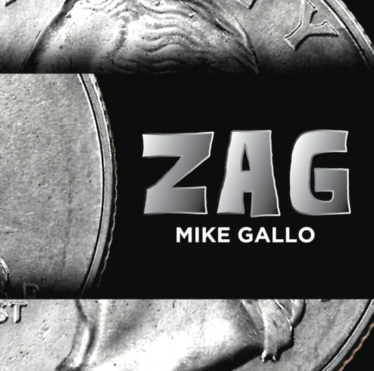 Hands performing “Zag” magic trick by Mike Gallery with a zig zag coin, showcasing the magic trick coin.