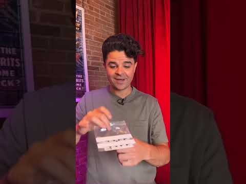 Magic trick demonstration showing a playing card in a clear plastic bag, and a stylized graphic of the word "Lucid" on a dark background, featuring layers of playing cards. Video
