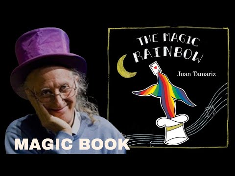The Magic Rainbow by Juan Tamariz Magic Book cover illustration of a rainbow emerging from a magician's hat, under a crescent moon, with musical notes in the background. Demo video 