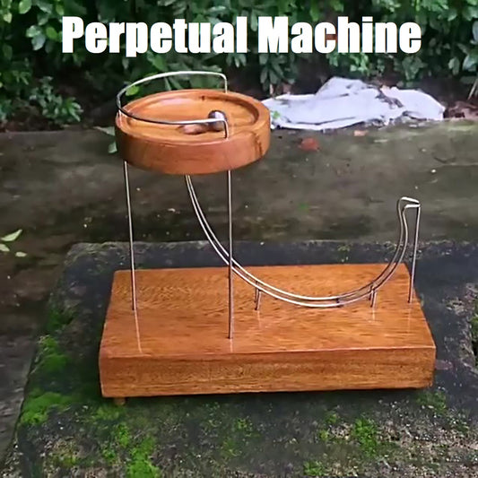 Wooden perpetual motion machine with a metal track and ball.
